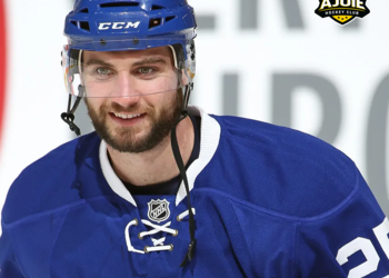 T.J. BRENNAN EN JAUNE & NOIR